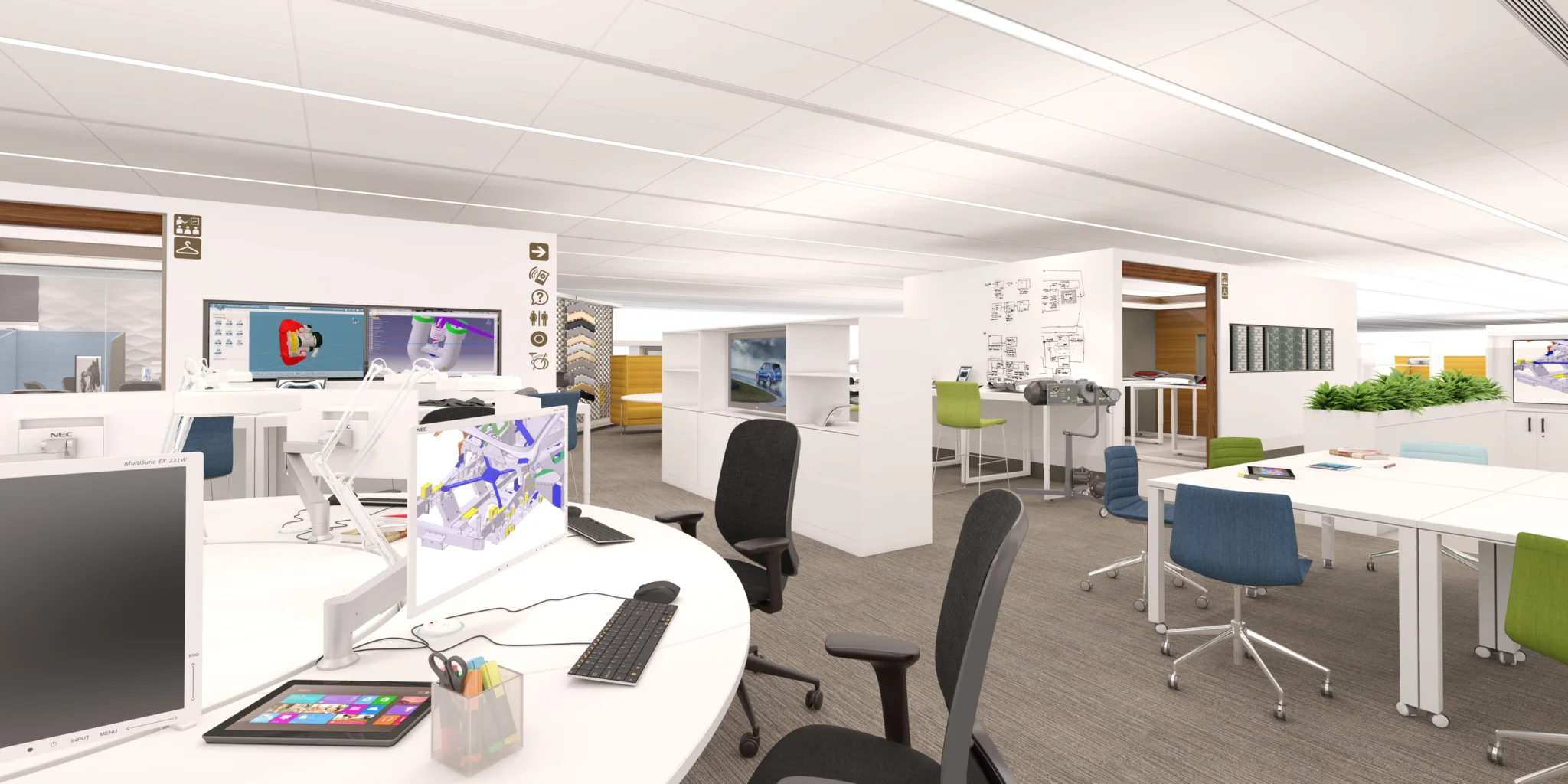 White open plan workspace with large circular desk in the foreground