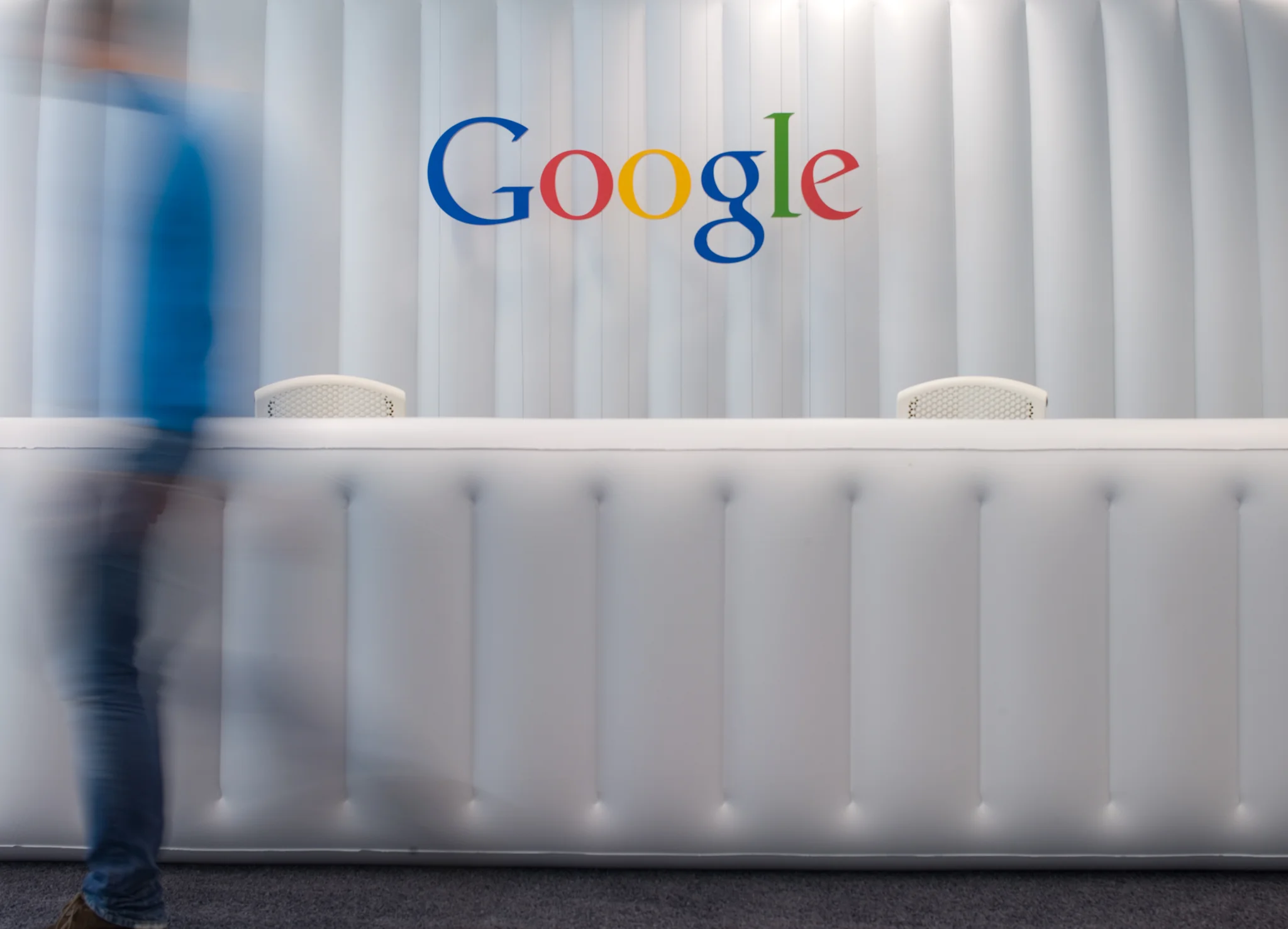 google white inflatable reception desk with coloured google logo