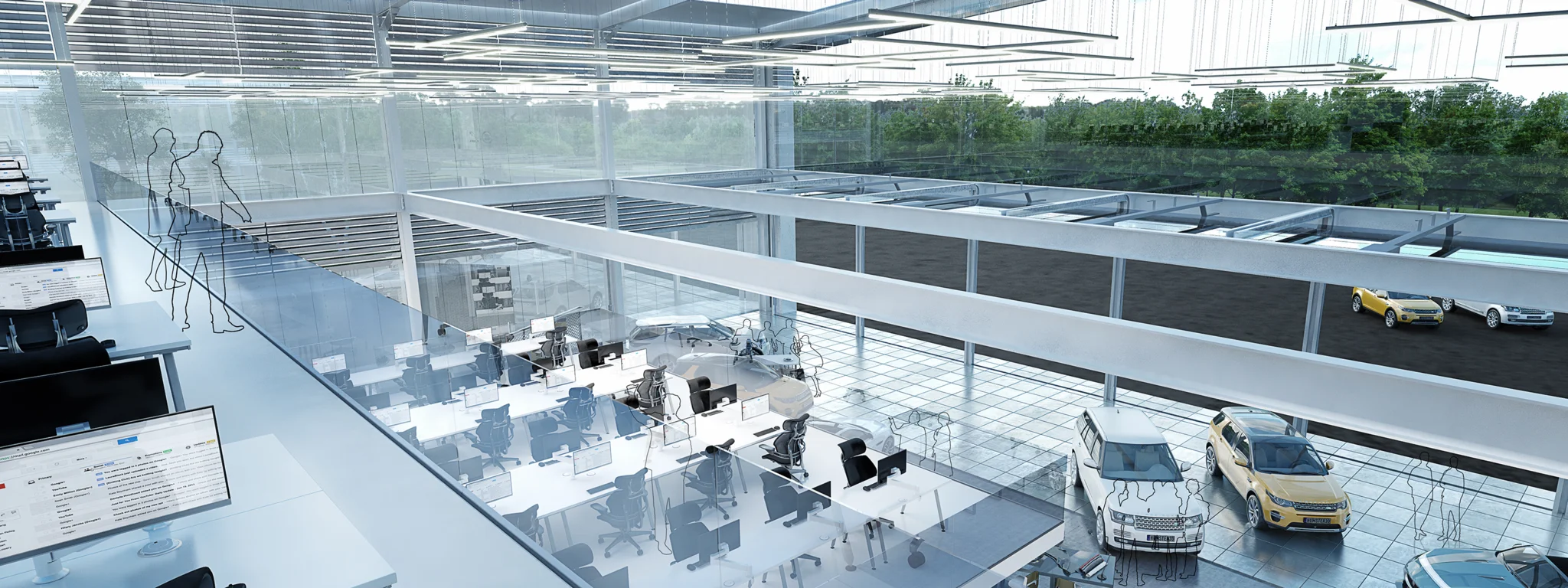 White double level open plan workspace with a variety of seating areas and desking, with Land Rover vehicles