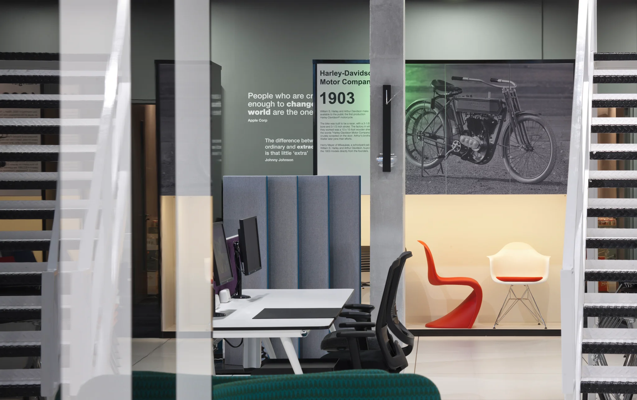 desk area and product showcases of furniture within a showroom space