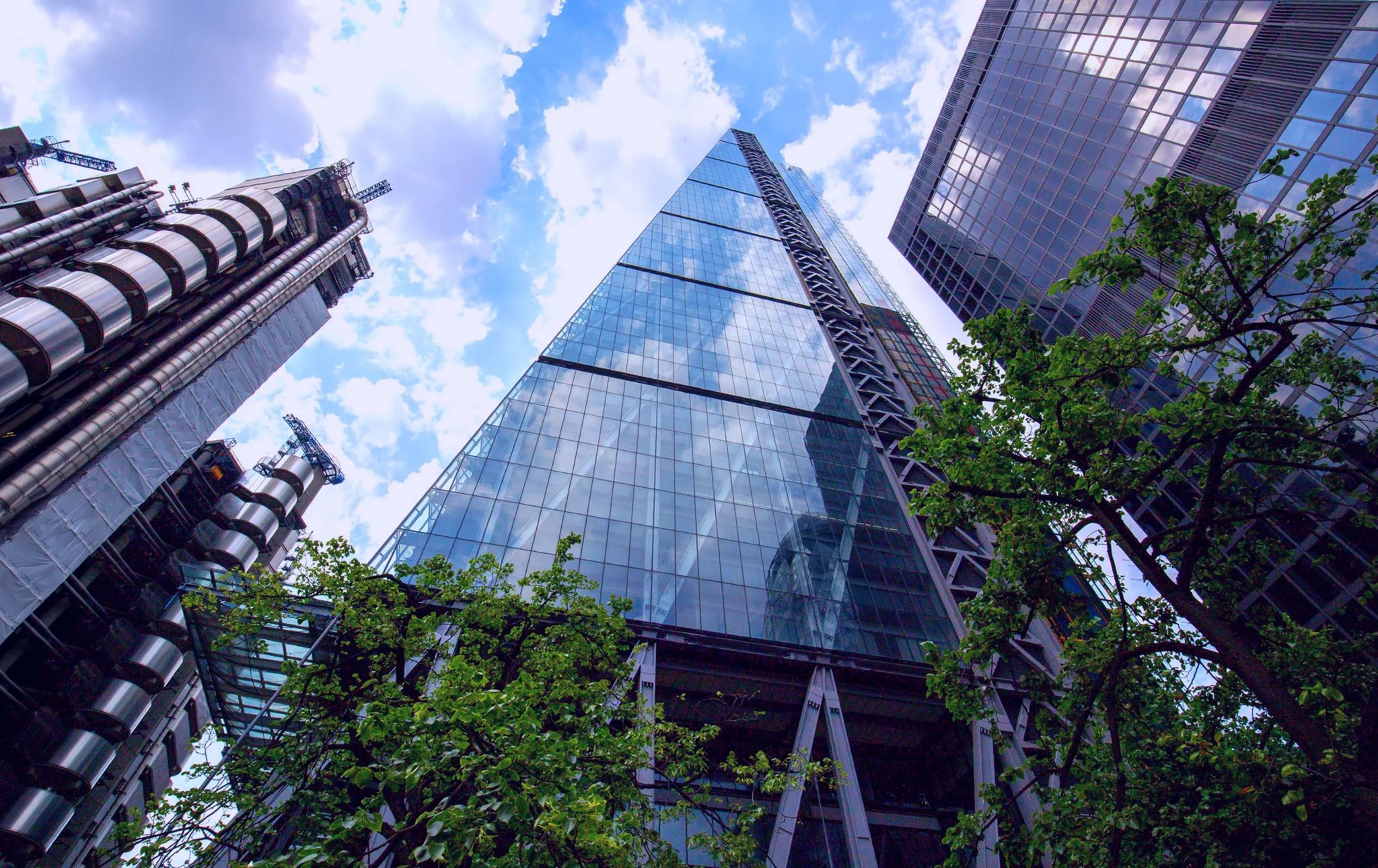 A low angle shot of the Leadenhall Building in London looking up it towards the sky.