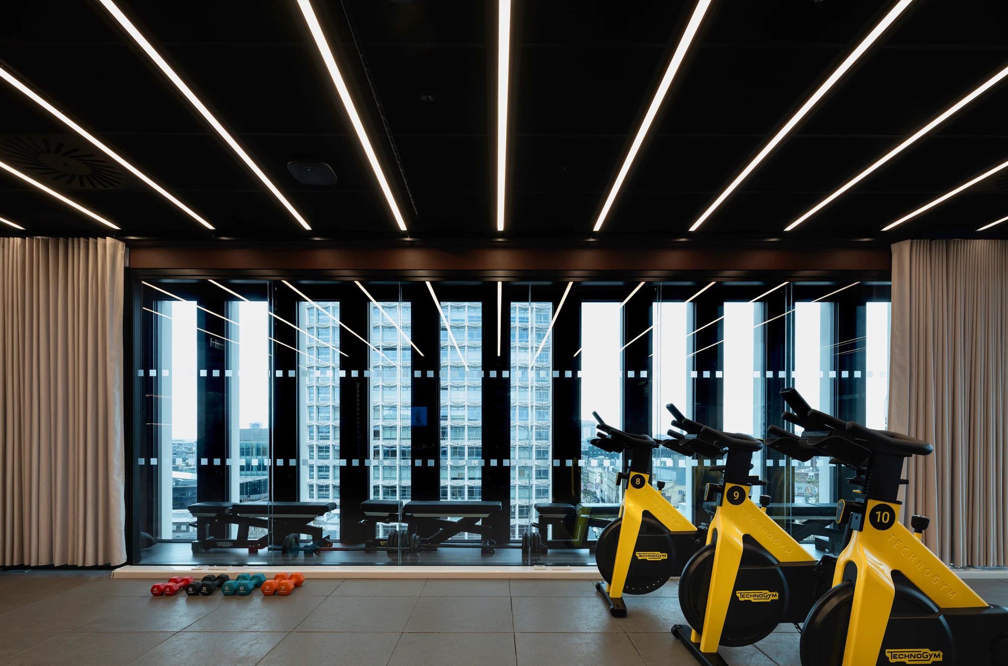 Employee fitness space with exercise bikes at GSK's headquarters